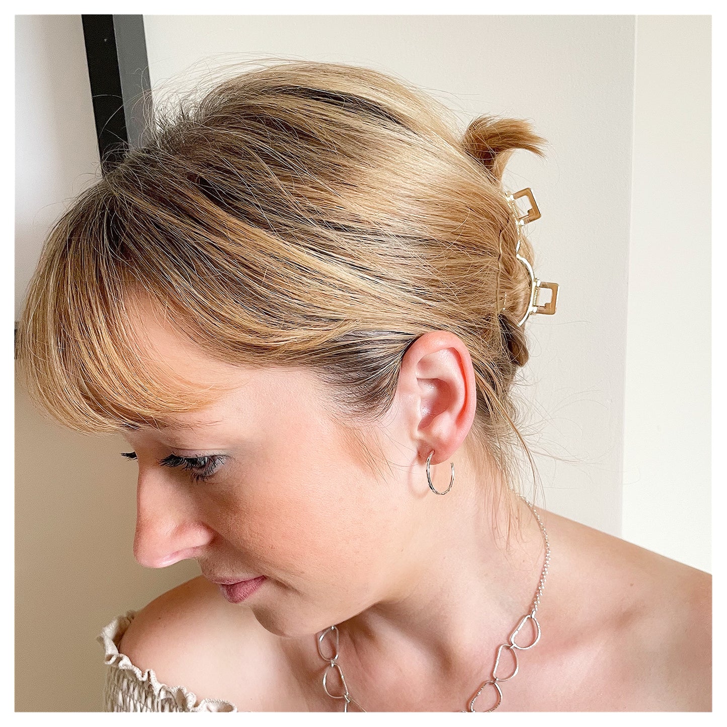 Sterling Silver Textured Hoop Earrings.