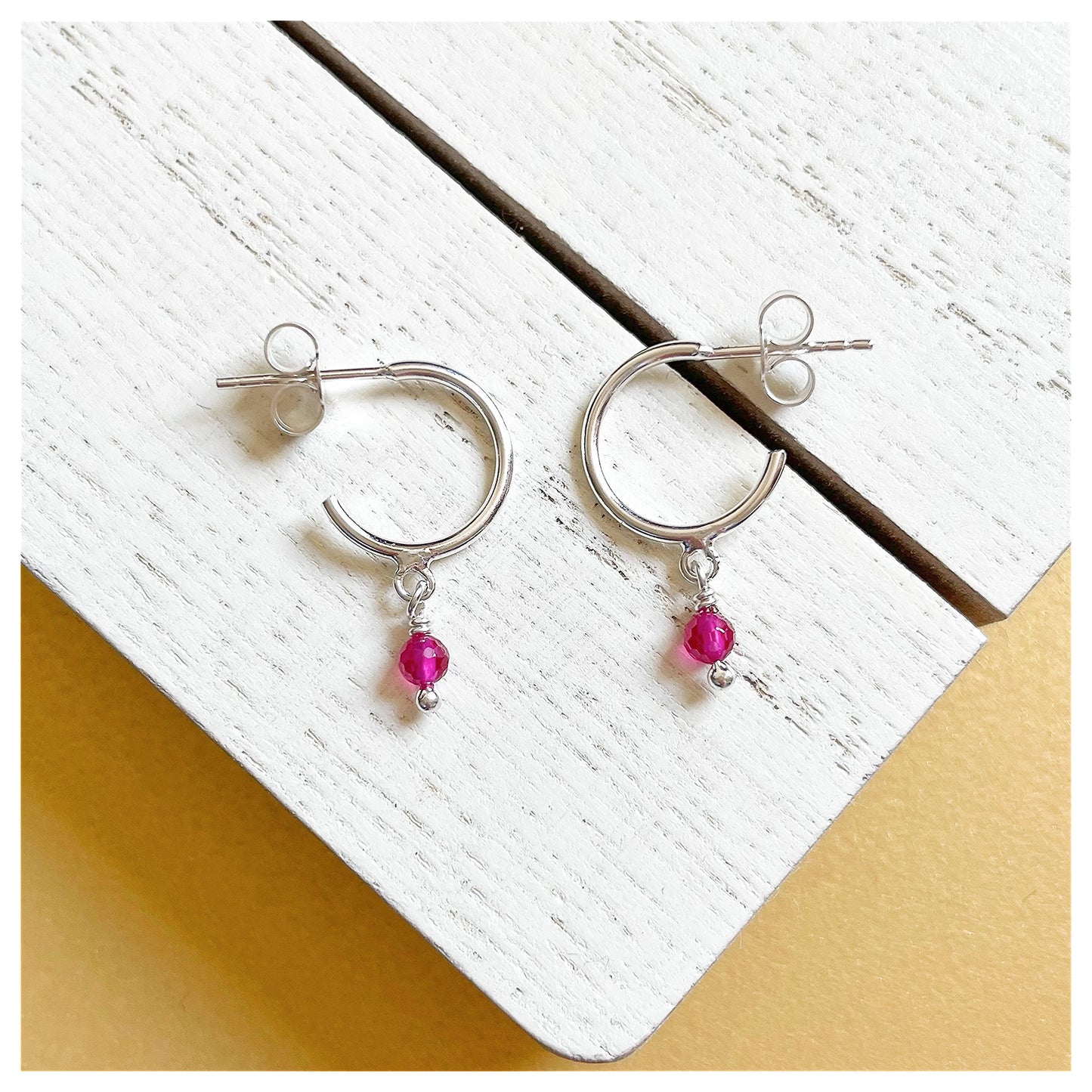 Sterling Silver and Pink Spinel Small Half Hoop Earrings.
