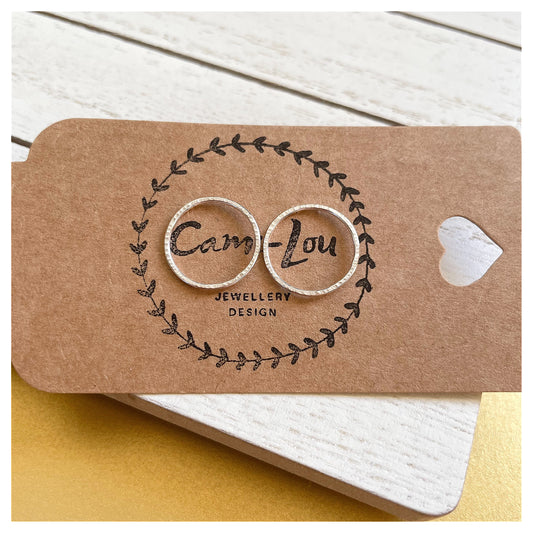 Small Sterling Silver Textured Circular Stud Earrings.