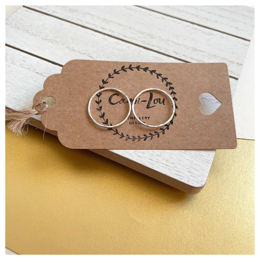 Medium Sterling Silver Hammered Circular Stud Earrings.