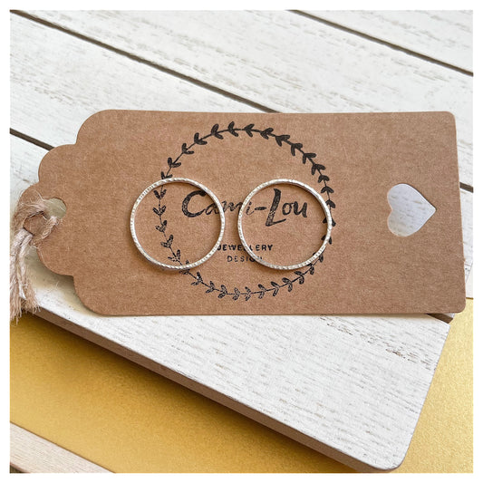 Medium Sterling Silver textured Circular Stud Earrings.